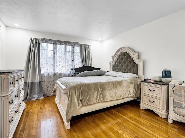 bedroom featuring light hardwood / wood-style flooring