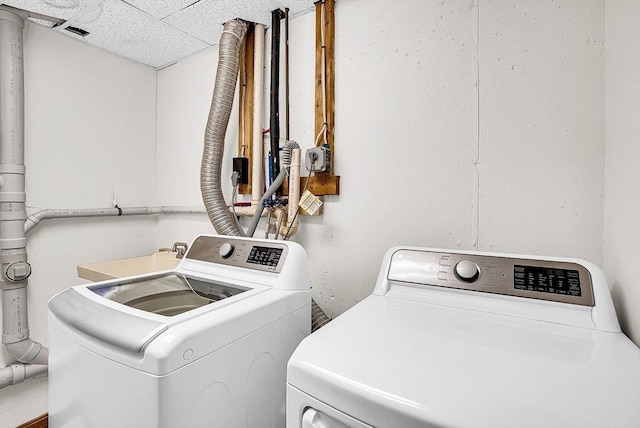 laundry room with washer and dryer