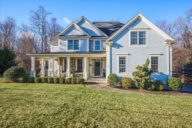 view of front of home featuring a porch and a front yard