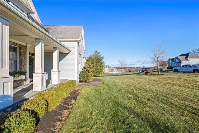 view of yard with a residential view