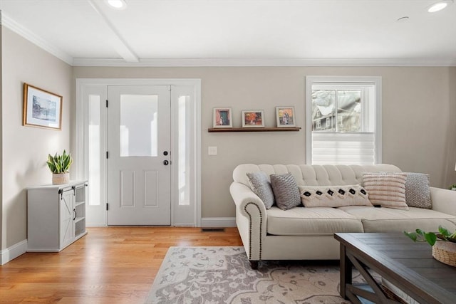 entryway featuring light hardwood / wood-style flooring and crown molding