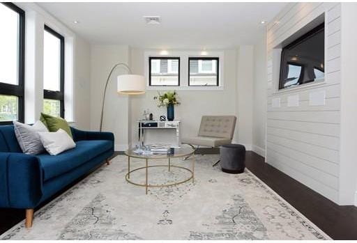 living area with light hardwood / wood-style flooring