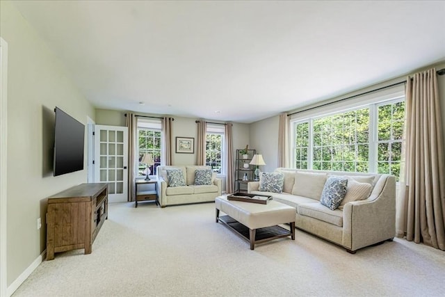 living room with light colored carpet