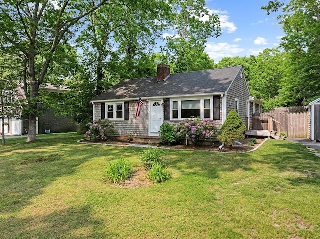 42 Deer Hollow Rd, Sandwich, MA 02644 - view of front of house with a chimney and roof with shingles