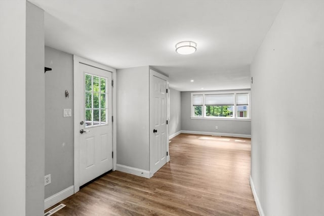 42 Deer Hollow Rd, Sandwich, MA 02644 - foyer with wood finished floors and healthy amount of natural light