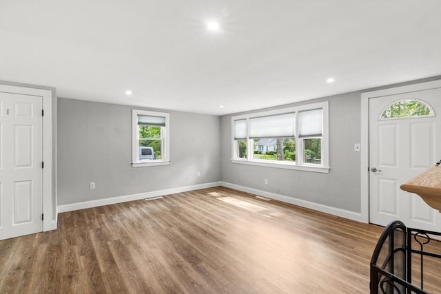 42 Deer Hollow Rd, Sandwich, MA 02644 - foyer with wood finished floors and recessed lighting