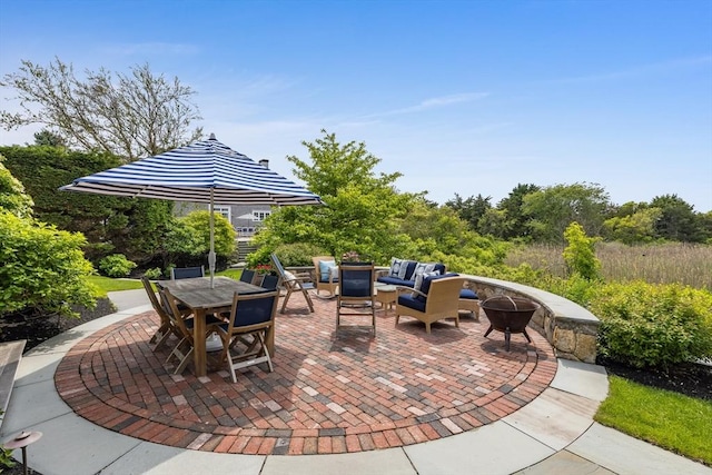 86 Champlain, Chatham, MA 02633 - view of patio with an outdoor living space with a fire pit and outdoor dining area