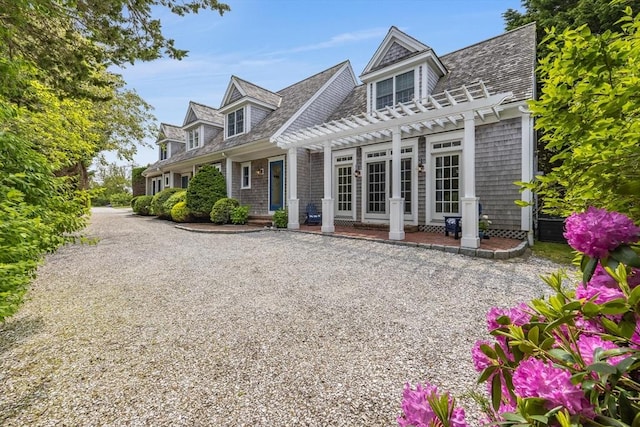 86 Champlain, Chatham, MA 02633 - back of house featuring a pergola and french doors
