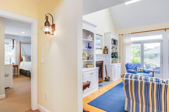 86 Champlain, Chatham, MA 02633 - home office featuring a brick fireplace, vaulted ceiling, and built in shelves