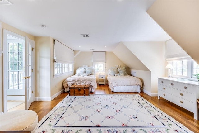 86 Champlain, Chatham, MA 02633 - bedroom featuring light wood-type flooring, lofted ceiling, and recessed lighting