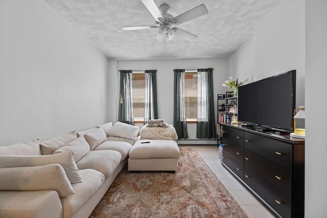 25 Sheafe St, Boston, MA 02113 - living area featuring a textured ceiling, light tile patterned flooring, a ceiling fan, and baseboard heating