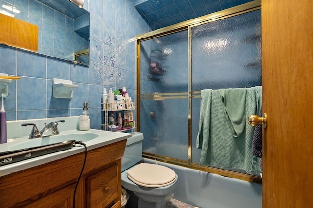 25 Sheafe St, Boston, MA 02113 - full bath featuring enclosed tub / shower combo, vanity, tile walls, and toilet