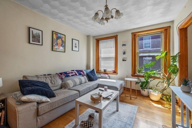 25 Sheafe St, Boston, MA 02113 - living room featuring a chandelier and wood finished floors