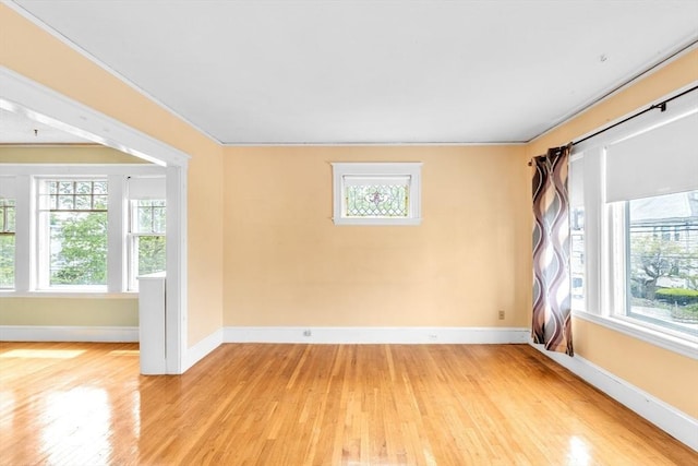17 Matchett St, Boston, MA 02135 - spare room with light wood-style flooring, healthy amount of natural light, and baseboards
