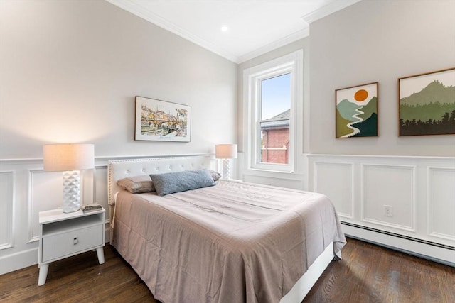 bedroom featuring baseboard heating, crown molding, and dark hardwood / wood-style flooring