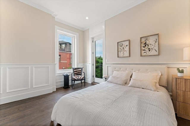 bedroom with access to outside, dark hardwood / wood-style floors, and ornamental molding