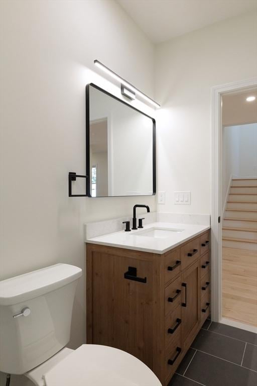 59 Dartmouth St Unit B, Somerville, MA 02145 - bathroom with toilet, vanity, and tile patterned floors