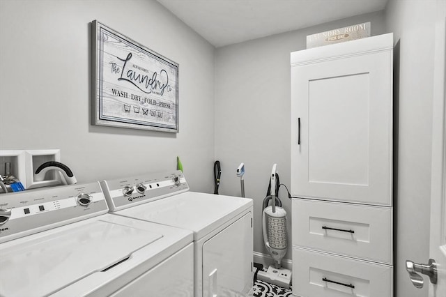 laundry area with washing machine and dryer and laundry area