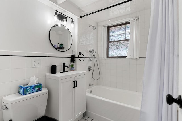 1992 Commonwealth Ave Unit B, Boston, MA 02135 - bathroom featuring shower / tub combo, toilet, tile walls, and vanity