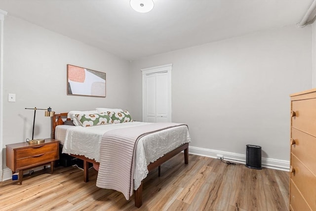 1992 Commonwealth Ave Unit B, Boston, MA 02135 - bedroom with light wood-style floors, baseboards, and a closet