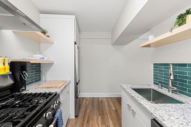 1992 Commonwealth Ave Unit B, Boston, MA 02135 - kitchen with open shelves, a sink, wall chimney exhaust hood, and appliances with stainless steel finishes