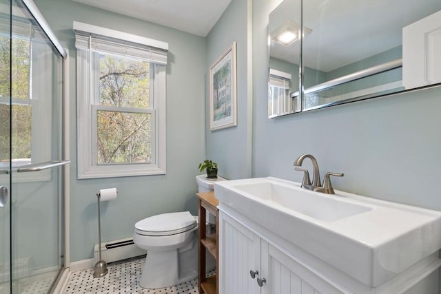 bathroom with baseboard heating, a shower stall, and toilet