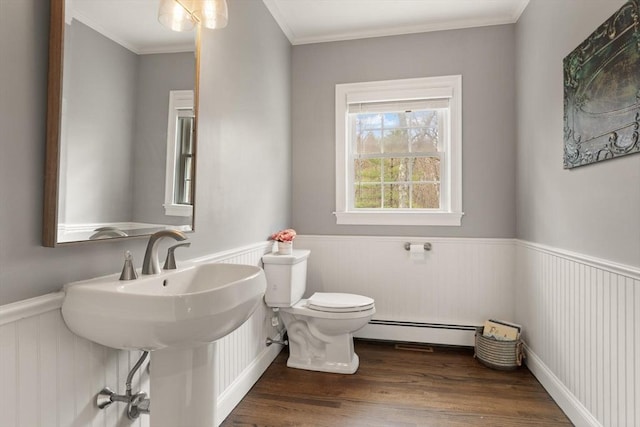 65 Stonegate Dr, East Bridgewater, MA 02333 - bathroom with crown molding, wainscoting, toilet, wood finished floors, and a baseboard radiator