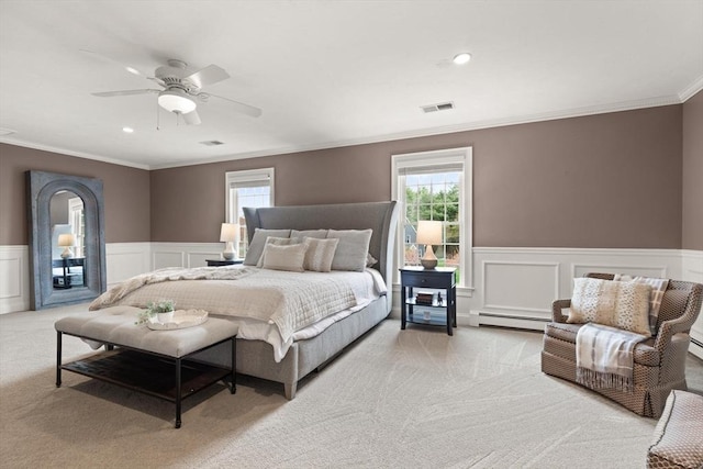 65 Stonegate Dr, East Bridgewater, MA 02333 - bedroom with light carpet, a wainscoted wall, a baseboard radiator, visible vents, and ornamental molding