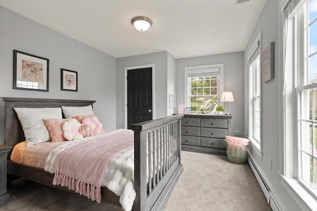 65 Stonegate Dr, East Bridgewater, MA 02333 - bedroom with light carpet and a baseboard radiator