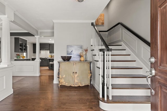 65 Stonegate Dr, East Bridgewater, MA 02333 - staircase featuring crown molding, decorative columns, and wood finished floors