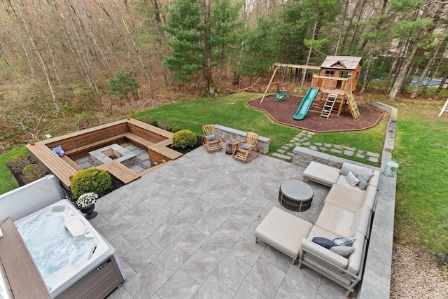 65 Stonegate Dr, East Bridgewater, MA 02333 - view of patio / terrace featuring an outdoor living space with a fire pit and a playground