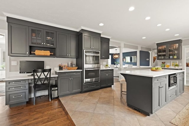 65 Stonegate Dr, East Bridgewater, MA 02333 - kitchen with light countertops, recessed lighting, appliances with stainless steel finishes, and ornamental molding