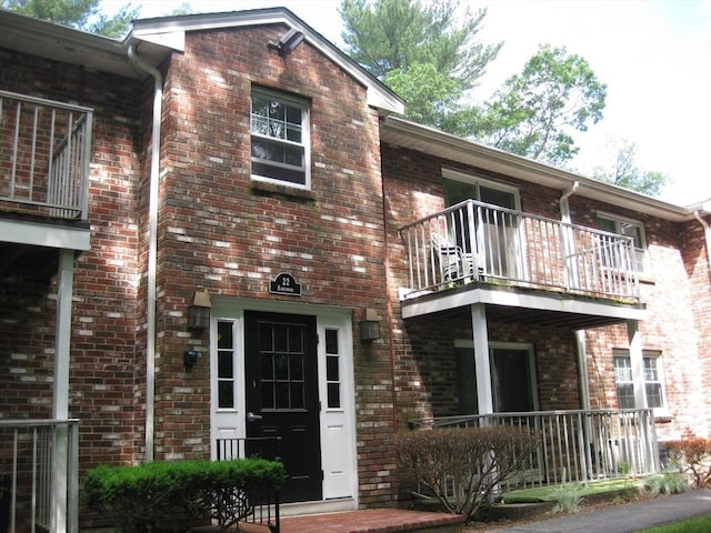 22 Kingswood Dr Unit 6F, Abington, MA 02351 - view of front facade with a balcony and brick siding