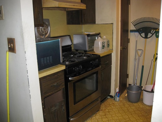 22 Kingswood Dr Unit 6F, Abington, MA 02351 - kitchen featuring stainless steel range with gas cooktop, exhaust hood, black microwave, dark brown cabinets, and light countertops