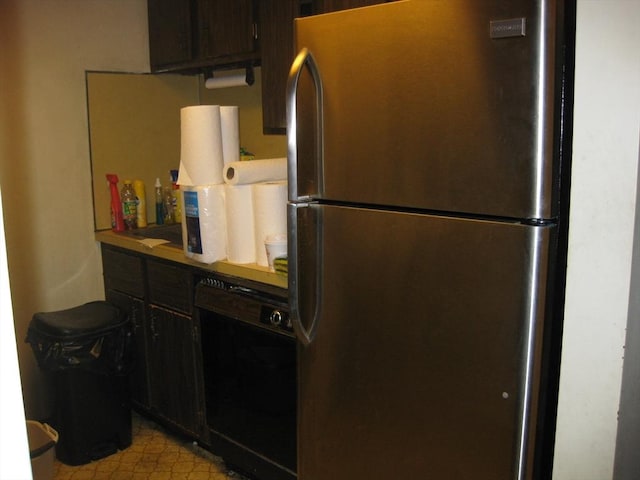 22 Kingswood Dr Unit 6F, Abington, MA 02351 - kitchen featuring freestanding refrigerator and black dishwasher
