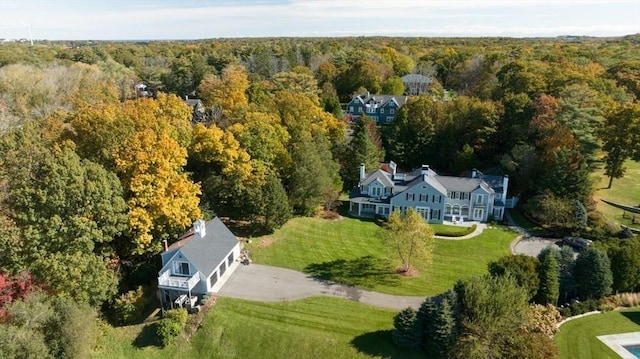 aerial view featuring a view of trees