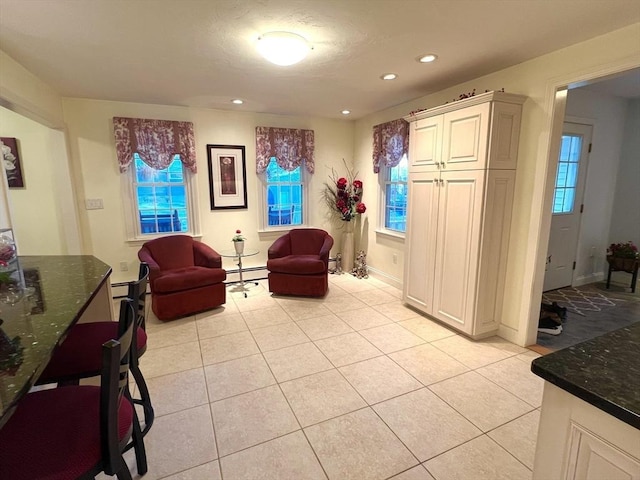 7 Glen Ave, Millbury, MA 01527 - interior space featuring baseboard heating, recessed lighting, baseboards, light tile patterned floors, and a baseboard radiator