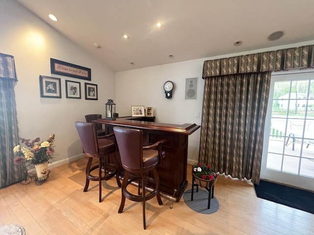 7 Glen Ave, Millbury, MA 01527 - bar with recessed lighting, lofted ceiling, a dry bar, and light wood finished floors
