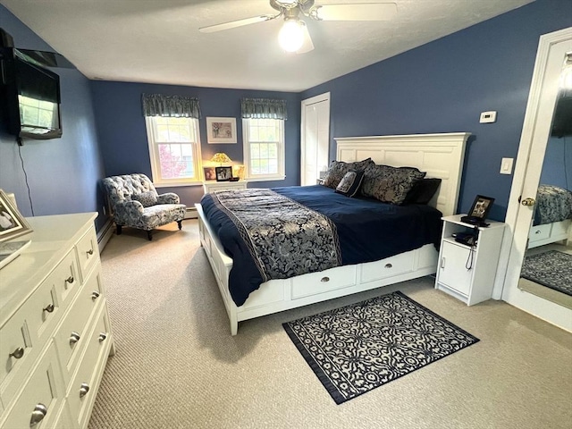 7 Glen Ave, Millbury, MA 01527 - bedroom with a ceiling fan, a baseboard heating unit, and light carpet