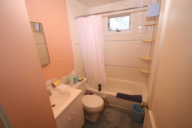 bathroom featuring shower / bathtub combination with curtain, toilet, vanity, and tile patterned flooring