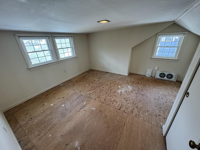 additional living space with a wealth of natural light and lofted ceiling