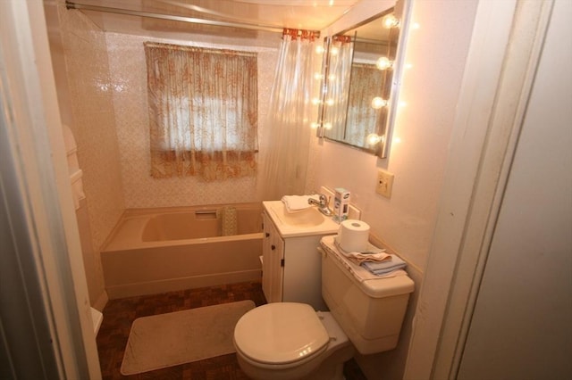 full bathroom featuring toilet and vanity