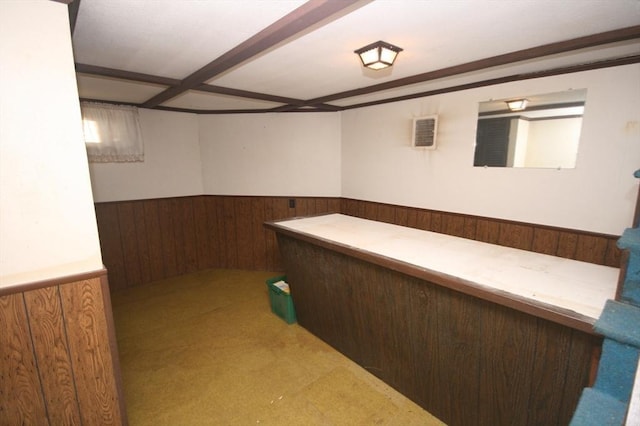 bar with wooden walls, visible vents, and a wainscoted wall