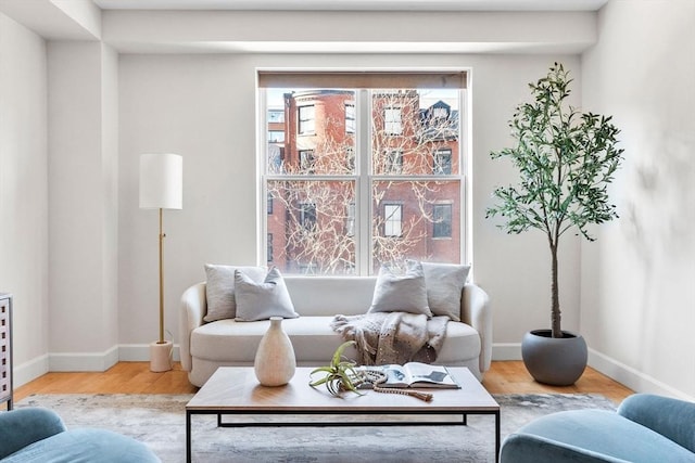 sitting room featuring hardwood / wood-style floors