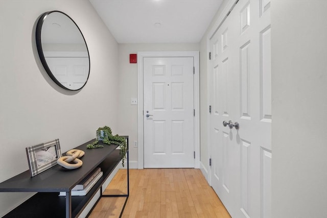 doorway to outside featuring light hardwood / wood-style flooring