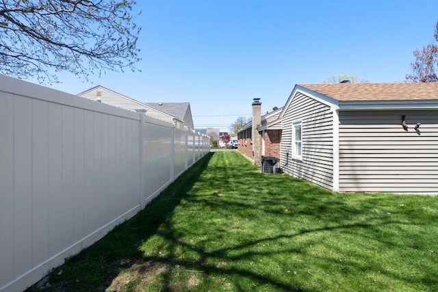 view of yard with fence