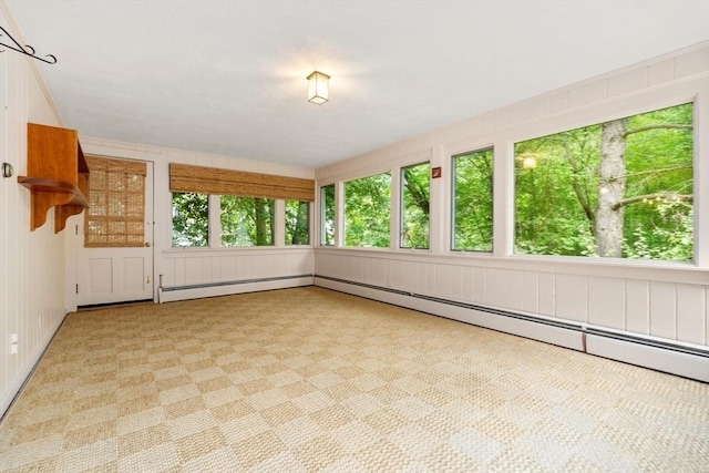 unfurnished sunroom featuring a wealth of natural light