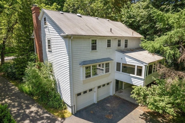 exterior space with a garage