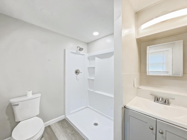 48-50 S Westfield St, Agawam, MA 01030 - full bathroom with wood finished floors, vanity, a shower, and toilet