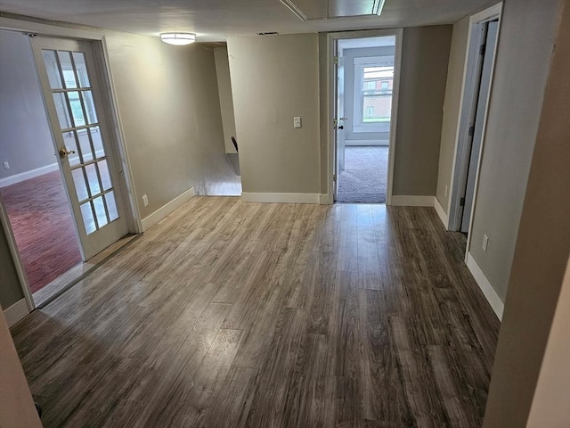 48-50 S Westfield St, Agawam, MA 01030 - unfurnished room featuring wood finished floors, baseboards, attic access, and healthy amount of natural light